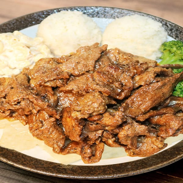Hana Hawaiian BBQ plate with glistening beef, two scoops of rice, macaroni salad, and broccoli.
